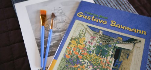 gustave baumann painting book with paintbrushes