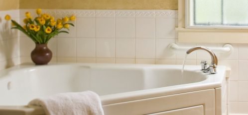 Room 212 bathtub with slippers