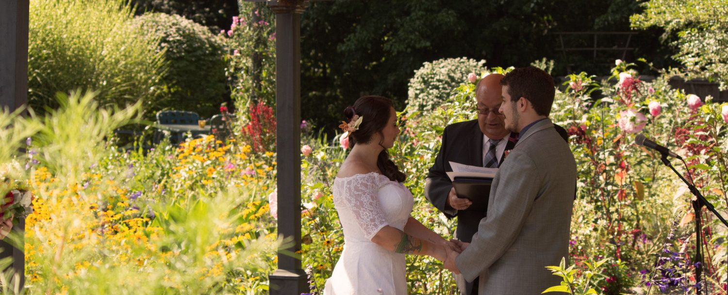 bride and groom read vows
